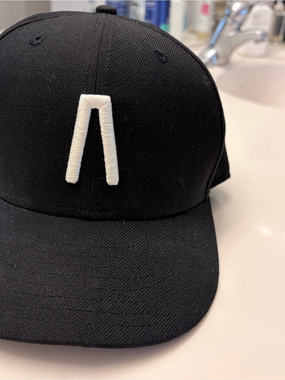 Fear of God Athletics Black Baseball Cap with White Raised A Logo